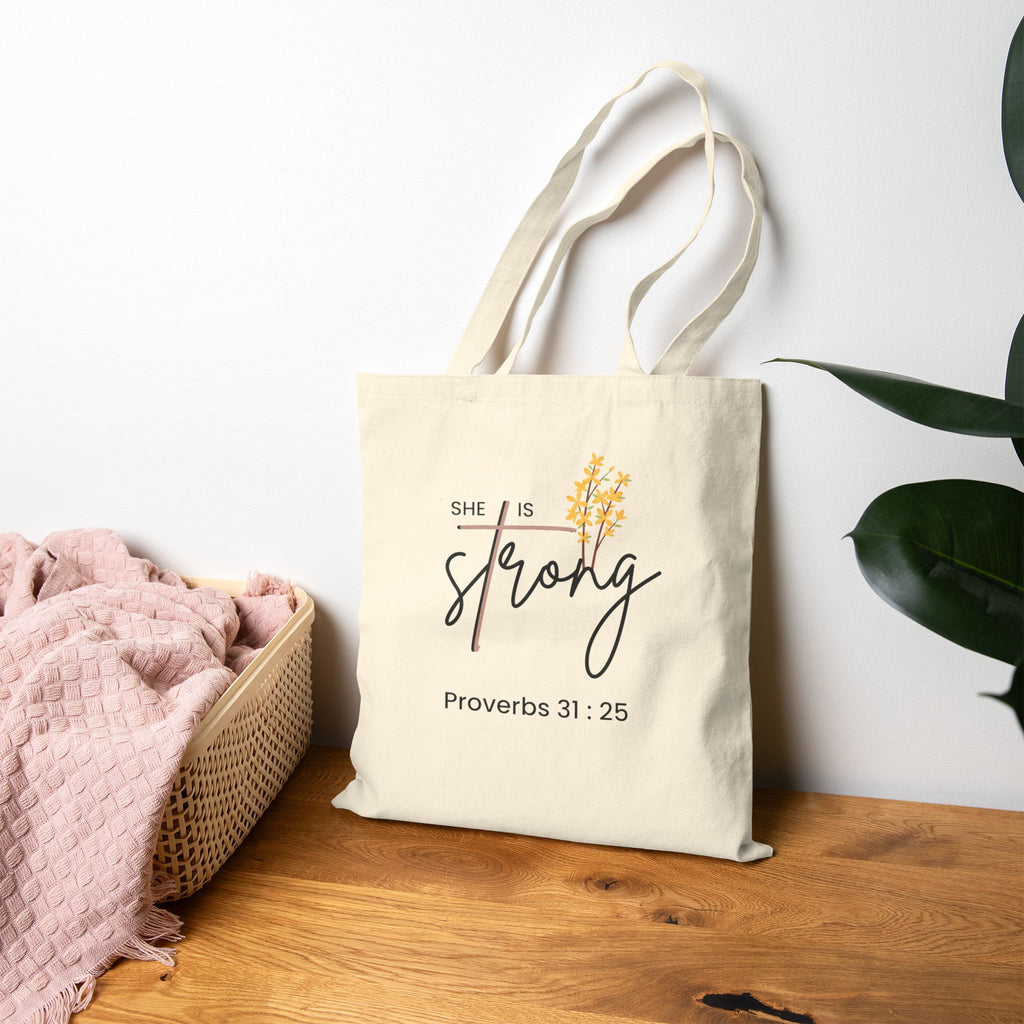 She Is Strong Cotton Tote Bag – Proverbs 31:25 Inspirational Scripture Canvas Tote